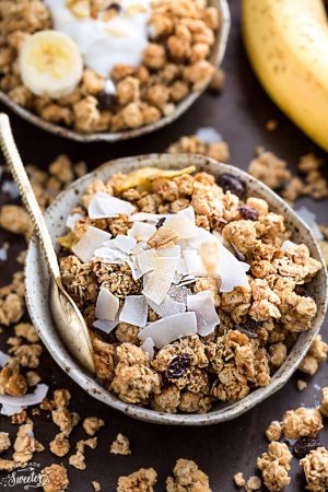 Banana Nut Granola makes the perfect healthy breakfast or snack. Best of all, it's gluten-free, refined sugar free, dairy free and comes together easily in just one bowl and less than 10 minutes of prep time! Full of crunchy clusters, pecans and tropical coconut.