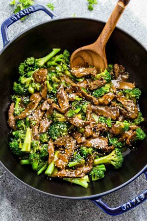 This Skinny Beef and Broccoli Stir-Fry makes the perfect easy weeknight dish full of authentic flavors. Best of all, it's so easy to make with authentic flavors and way better than your favorite Chinese takeout restaurant. Great for meal prep Sunday and leftovers can be used for work or school lunch bowls!