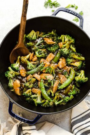 Chicken Stir Fry with Broccoli Snap Peas is the perfect easy weeknight meal. Best of all, comes together in under 30 minutes with your favorite vegetables and sticky and savory Asian sauce. Great for Sunday meal prep for work or school lunchboxes or lunch bowls. Full of flavor and way better than takeout!