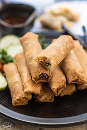 Chinese Spring Rolls (Egg Rolls) - authentic family favorite recipe, perfectly golden and makes the perfect appetizer for Chinese (Lunar) New Year, game day or any other party. Best part of all, there are secret family tips, instructions for a baked or fried version. The perfect balance of meat, veggies and comes out crispy, delicious and seriously amazing!!