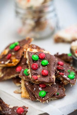 Christmas Cracker Toffee - 7 Ways with Saltine & Graham Crackers makes an easy and addictive treat perfect for the holidays! Best of all, takes as little as 4 ingredients and SUPER EASY to customize!