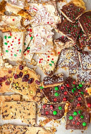Christmas Cracker Toffee - 7 Ways with Saltine & Graham Crackers makes an easy and addictive treat perfect for the holidays! Best of all, takes as little as 4 ingredients and SUPER EASY to customize!