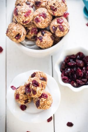 No Bake Cranberry Coconut Energy Bites make the perfect healthy gluten free snack on the go and are so easy to make and customize. Best of all, they make a great vegan, gluten free snack option with NO added REFINED sugar. Great for Sunday meal prep for adding to back to school or work lunchboxes.