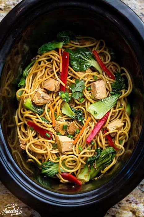 Crock pot Slow Cooker Chicken Lo Mein makes the perfect easy Asian-inspired weeknight meal! Best of all, takes only 15 minutes to put together with the most authentic flavors! So delicious and way better than any Chinese takeout! Leftovers make great lunch bowls or for your weekly meal prepping for school or work lunches and even dinner!
