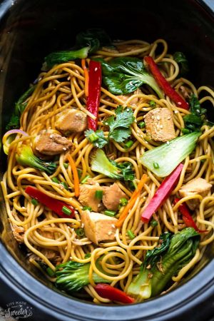 Crock pot Slow Cooker Chicken Lo Mein makes the perfect easy Asian-inspired weeknight meal! Best of all, takes only 15 minutes to put together with the most authentic flavors! So delicious and way better than any Chinese takeout! Leftovers make great lunch bowls or for your weekly meal prepping for school or work lunches and even dinner!