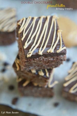 Double Chocolate Peanut Butter Krispy Treats from - Rich and delicious chocolate Rice Krispy Treats topped with a decadent chocolate and peanut butter ganache. @LifeMadeSweeter