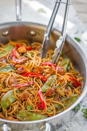 Easy Chicken Lo Mein makes the perfect easy Asian-inspired weeknight meal! Best of all, takes less than 30 minutes to make with the most authentic flavors! So delicious and way better than any Chinese takeout! Leftovers make great lunch bowls or for your weekly meal prepping for school or work lunches and even dinner!