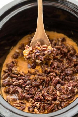 Slow Cooker Paleo Sweet Potato Casserole makes the perfect healthy and easy side dish for Thanksgiving or the Christmas holiday. Best of all, it's made in your crock pot so you can free up your oven! No preboiling required!