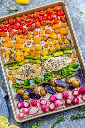 Lemon Herb Chicken with Rainbow Vegetables makes the perfect easy weeknight or Sunday meal. Best, of all, everything cooks up in just ONE sheet pan with minimal clean-up and it's perfect for Sunday meal prep! Leftovers are also great for your work lunchboxes and lunch bowls! A colorful and healthy spring or summer meal!