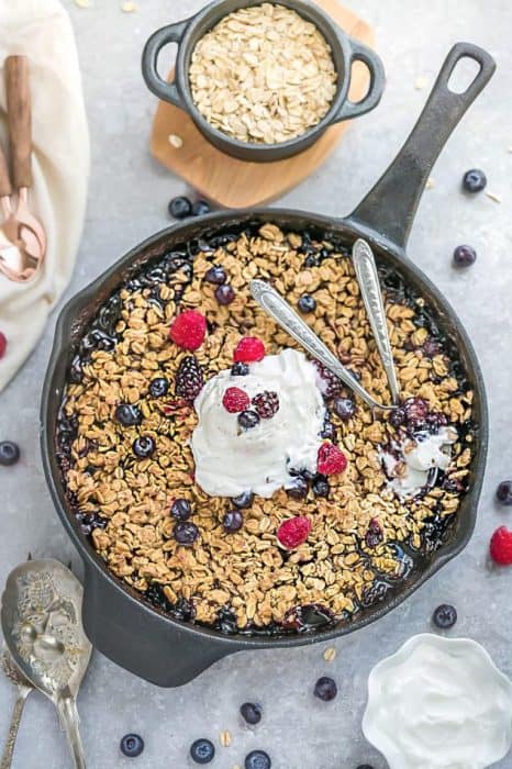 This delicious Mixed Berry Skillet Crisp is the perfect easy dessert to use up any summer or frozen berries. Best of all, there's only 10 minutes of prep time and is loaded with strawberries, blueberries, blackberries and raspberries. Plus, it's healthier than most crisps and crumbles since it's gluten-free, vegan and refined sugar free.