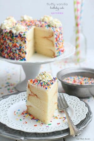 My favorite Vanilla Birthday Cake with Vanilla Bean Frosting - A light, fluffy and delicious frosted vanilla cake with sprinkles – perfect for a birthday or any celebration! by @LifeMadeSweeter