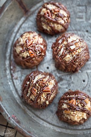 No Bake German Chocolate Cake Cookies make the perfect easy gluten free, paleo and dairy free treat. You will never guess it's healthier since it has all the classic flavors of the popular rich and decadent cake. Loaded with healthy chocolatey oats, a creamy coconut pecan frosting and best of all, no oven required!