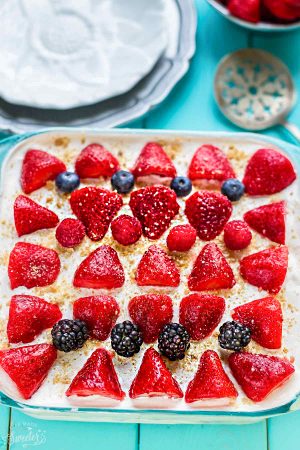 No Bake Mixed Summer Berry Icebox Cake is the perfect easy dessert for potlucks, barbecues, cookouts, picnics, baby showers, or any Fourth of July or Memorial Day party with the red, white and blue theme. Best of all, instead of triple, it's got four berries - strawberries, blackberries, blueberries and raspberries with 10 minutes of prep time containing fresh whipped cream, cream cheese & graham crackers.