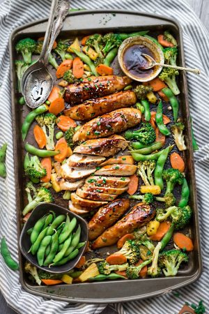 One Sheet Pan Teriyaki Chicken with Vegetables makes the perfect easy weeknight meal! Best of all, everything cooks up onto just ONE sheet pan with minimal cleanup!