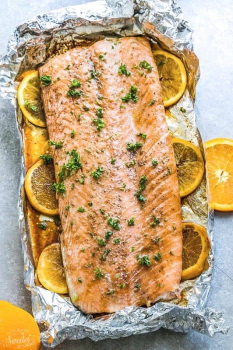 Baked Orange Sesame Salmon in Foil - is the perfect easy and healthy weeknight recipe. Best of all, the salmon is cooked to tender, flaky perfection in just 30 minutes with a flavorful orange sesame glaze.