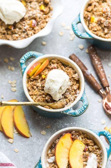 This recipe for Peach Crisp is the perfect easy treat to celebrate the end of summer. Best of all, this delicious dessert is gluten free, butter free and is less in added sugar. Made with fresh juicy sweet peaches, and the crispiest oat crumble topping. Serve it bubbling hot with some creamy vanilla frozen yogurt or vanilla ice cream for the ultimate dessert.