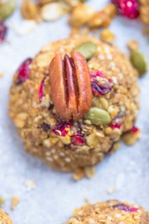 These Pumpkin Breakfast Cookies are the perfect easy breakfast for on the go. Best of all, this recipe is great if you feel like a no bake cookie when it's too hot to turn on the oven or you can bake them for 10 minutes for a warm treat. They're also loaded with cinnamon and pumpkin pie spice and totally scream fall. Plus they're gluten free, made with no butter and are super easy to customize with your favorite add-ins.