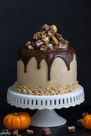 Pumpkin Snickers Layer Cake with Salted Caramel Frosting makes an impressive dessert for any holiday