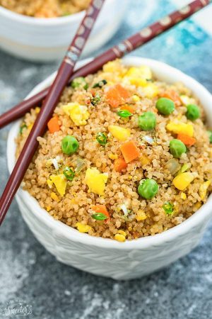 Quinoa Fried Rice makes a simple and healthy alternative to traditional fried rice. Full of protein and vegetables and just perfect for busy weeknights. Best of all, instructions included to make it in your Instant Pot pressure cooker or on the stove!