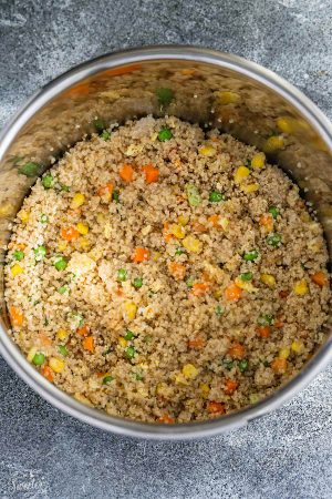 Quinoa Fried Rice makes a simple and healthy alternative to traditional fried rice. Full of protein and vegetables and just perfect for busy weeknights. Best of all, instructions included to make it in your Instant Pot pressure cooker or on the stove!