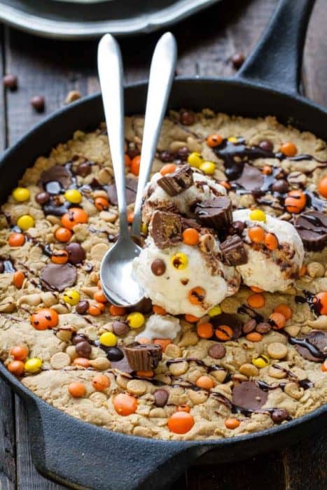 Reese's Peanut Butter Skillet Cookie is soft, chewy & makes the perfect treat to share with a crowd!