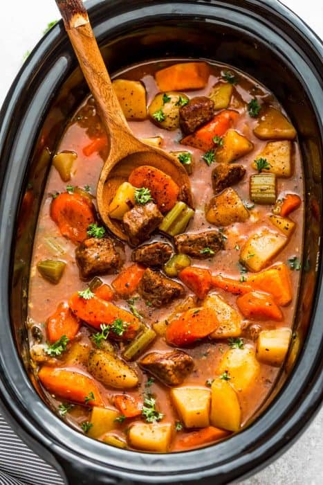 Slow Cooker Homemade Beef Stew makes the perfect comforting dish on a cold day. Best of all, it’s easy to make and simmers in the crock-pot for the most tender meat with carrots, potatoes, sweet potatoes and celery.