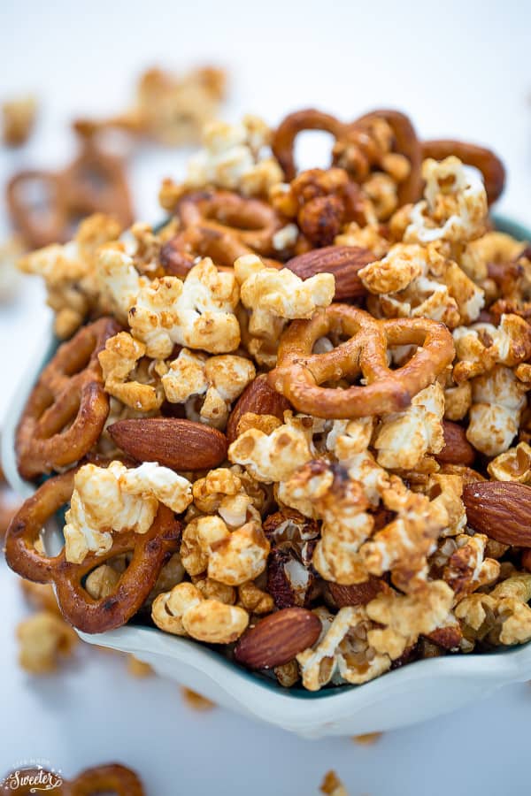 Slow Cooker Caramel Popcorn makes the perfect easy and addictive snack!