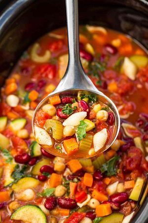 Slow Cooker Homemade Minestrone Soup makes the perfect easy comforting meal. Best of all, it's an easy set and forget recipe and is so much healthier and better than Olive Garden's version! Made entirely in your crock-pot and SO delicious!