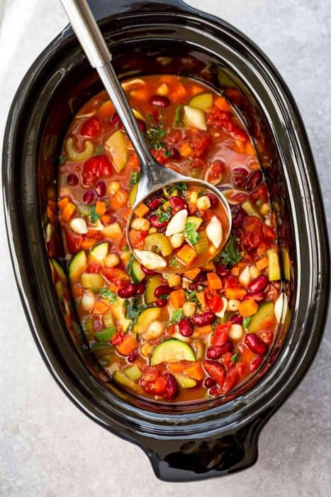 Slow Cooker Homemade Minestrone Soup makes the perfect easy comforting meal. Best of all, it's an easy set and forget recipe and is so much healthier and better than Olive Garden's version! Made entirely in your crock-pot and SO delicious!