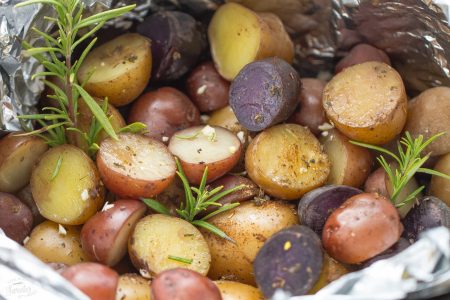 Slow Cooker Rosemary Garlic Tri-color Potatoes makes an easy side dish.