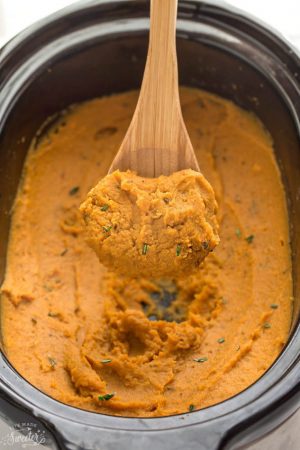 Slow Cooker Mashed Sweet Potatoes make the perfect easy side dish. They cook up super creamy all in your crock-pot! The best part about them is that there is no pre-boiling required!