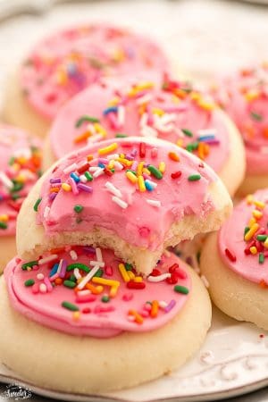 Soft Lofthouse Style Frosted Sugar Cookies are the perfect sweet treat with a tall glass of milk