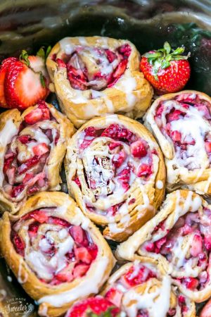 Easy Strawberry Cinnamon Rolls make the perfect indulgent treat for breakfast, brunch or even dessert. Best of all, these effortless rolls take no time at all in your oven or slow cooker using Pillsbury crescent roll dough, fresh strawberries and a cinnamon sugar filling. No yeast or rising required!