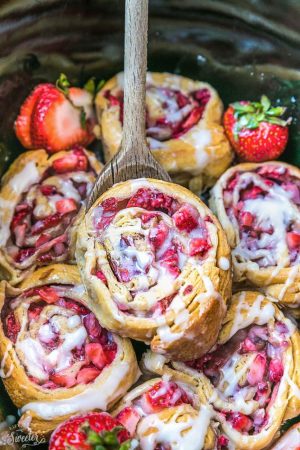 Easy Strawberry Cinnamon Rolls make the perfect indulgent treat for breakfast, brunch or even dessert. Best of all, these effortless rolls take no time at all in your oven or slow cooker using Pillsbury crescent roll dough, fresh strawberries and a cinnamon sugar filling. No yeast or rising required!