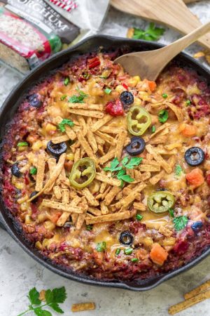 Skillet Tex Mex Casserole makes the perfect easy weeknight meal. You can use easily use chicken or turkey to use up any leftovers from Thanksgiving and the holidays. Best of all it's full of flavorful spices, veggies, quinoa, brown rice and cooks up in just one skillet!