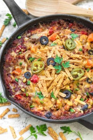 Skillet Tex Mex Casserole makes the perfect easy weeknight meal. You can use easily use chicken or turkey to use up any leftovers from Thanksgiving and the holidays. Best of all it's full of flavorful spices, veggies, quinoa, brown rice and cooks up in just one skillet!