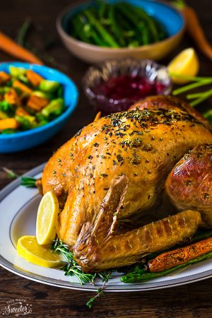 The BEST Garlic Herb Roasted Turkey with step-by-step photos and instructions to roast the perfect juicy, moist, tender and golden turkey bursting with flavor. No more dried out or bland turkey, this is the recipe to keep for years to come Thanksgiving, Christmas and all your holiday parties and dinners!