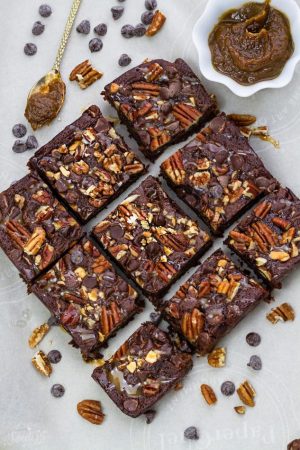 These Paleo Turtle Brownies taste completely indulgent while being secretly healthier, refined sugar free and gluten free. Best of all, this recipe is so easy to make and has all your favorite flavors of Turtles! Melt in your mouth and perfect for any fudgy brownie fans!